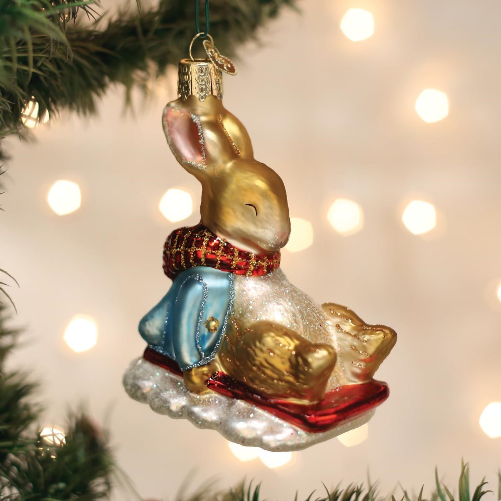 Old World Christmas Blown Glass Ornament for Christmas Tree, Peter Rabbit On Sled
