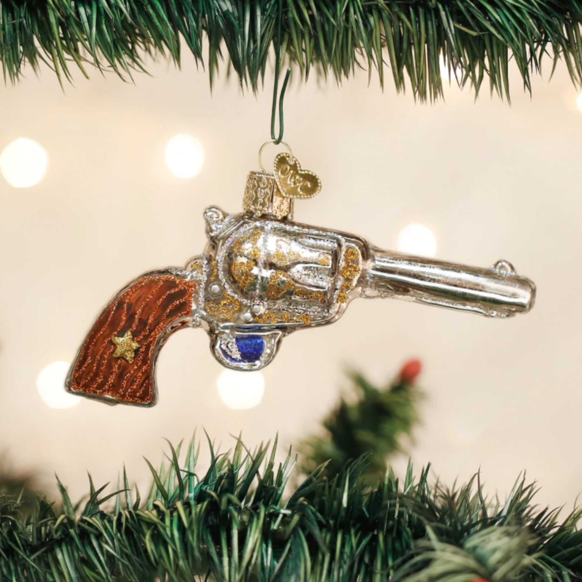 Old World Christmas Western Revolver Glass Blown Ornament