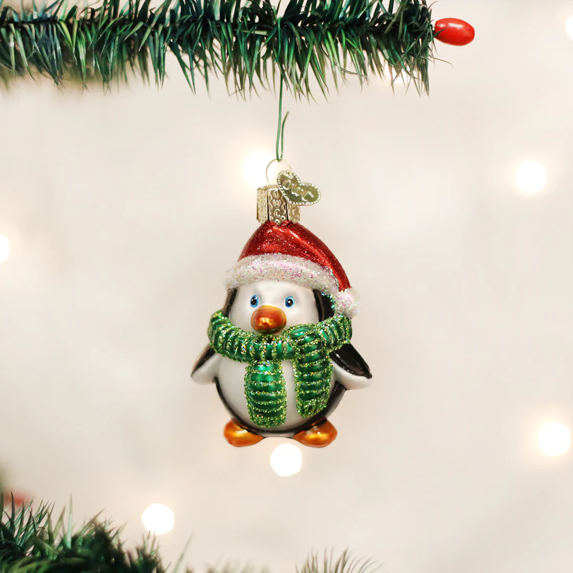 Old World Christmas Glass Blown Playful Penguin Ornament