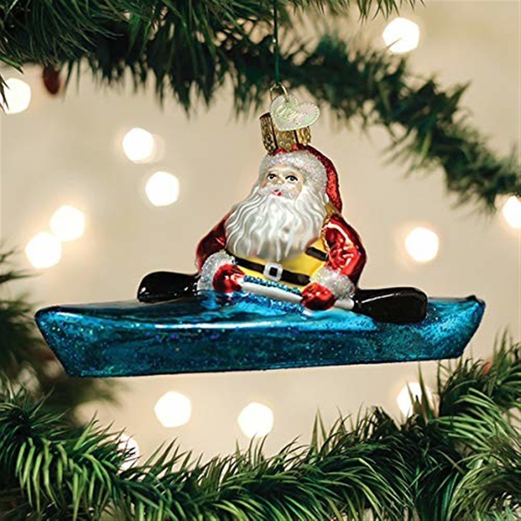 Old World Christmas Santa In Kayak Glassblown Ornament